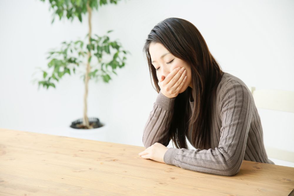 肩が重く、吐き気がする